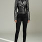 Scarlett Stitch black leather biker jacket with silver stud embellishments on sleeves and shoulders, worn by a model.