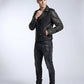 Scarlett Stitch black leather biker jacket with silver stud detailing on sleeves, worn by a man in dark jeans