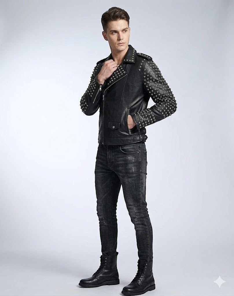 Scarlett Stitch black leather biker jacket with silver stud detailing on sleeves, worn by a man in dark jeans