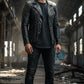 Scarlett Stitch black leather motorcycle jacket for men with silver studs, lapel collar, zip closure, and zippered cuffs.