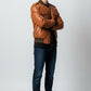 Scarlett Stitch men's tan genuine leather bomber jacket with ribbed collar, cuffs, hem, and epaulet details.