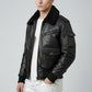 Scarlett Stitch black leather bomber jacket for men with faux fur collar, ribbed cuffs, and multiple pockets.