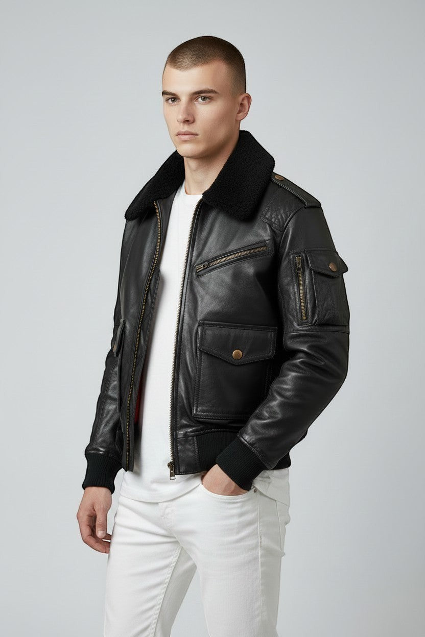 Scarlett Stitch black leather bomber jacket for men with faux fur collar, ribbed cuffs, and multiple pockets.