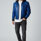 Scarlett Stitch men's blue faux leather hooded bomber jacket with quilted details and zip front.