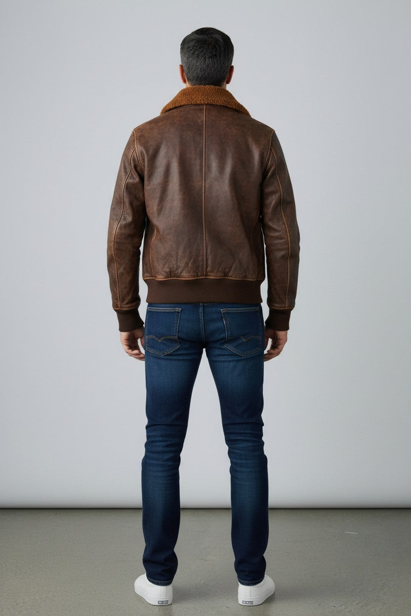Scarlett Stitch Men's distressed brown faux leather bomber jacket with sherpa collar, ribbed cuffs and hem.