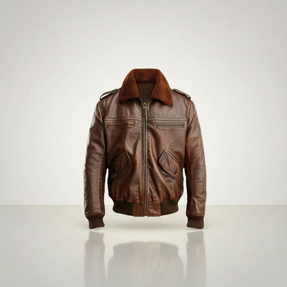 Scarlett Stitch men's brown genuine leather bomber jacket with detachable faux shearling collar, ribbed cuffs and hem, and zippered pockets.