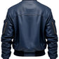 Scarlett Stitch Men's navy blue genuine leather bomber jacket with ribbed collar, cuffs, and hem. Features zippered sleeve pockets.