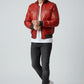 Scarlett Stitch Men's red leather bomber jacket with ribbed collar, cuffs, and zippered pockets.