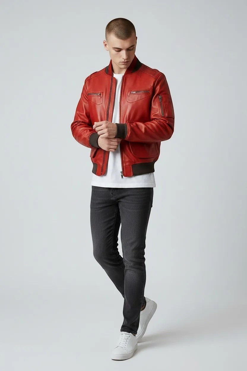 Scarlett Stitch Men's red leather bomber jacket with ribbed collar, cuffs, and zippered pockets.