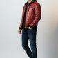 Scarlett Stitch men's red genuine leather moto jacket with quilted shoulders and detachable hood.